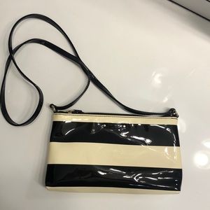 Black and cream patent leather crossbody purse